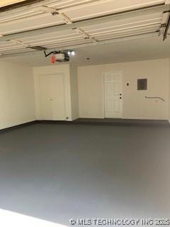 4822 S Quaker Ave, Tulsa, OK 74105 - garage featuring a garage door opener