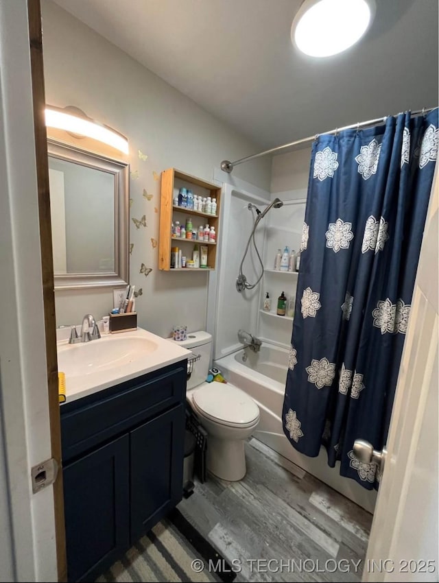 23422 E 79th St S, Broken Arrow, OK 74014 - bathroom with wood finished floors, shower / bathtub combination with curtain, and vanity
