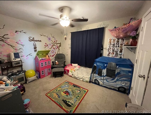 23422 E 79th St S, Broken Arrow, OK 74014 - recreation room with carpet floors and ceiling fan
