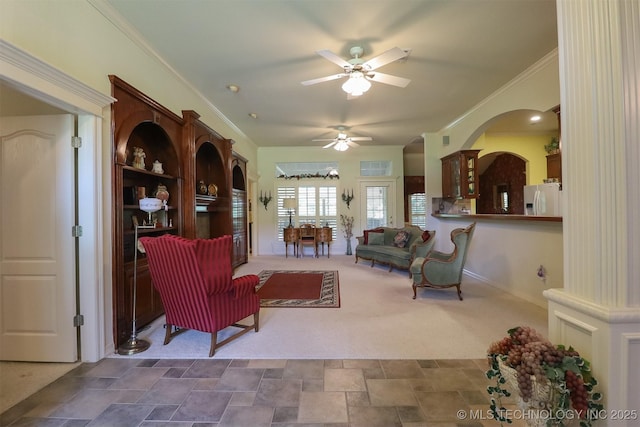 12310 S Mesa Rd, Sapulpa, OK 74066 - carpeted living area with a ceiling fan, stone finish floors, and ornamental molding