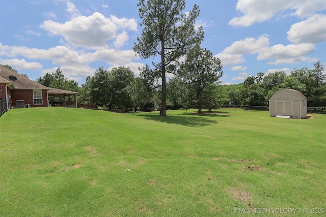 12310 S Mesa Rd, Sapulpa, OK 74066 - view of grassy yard featuring a storage unit
