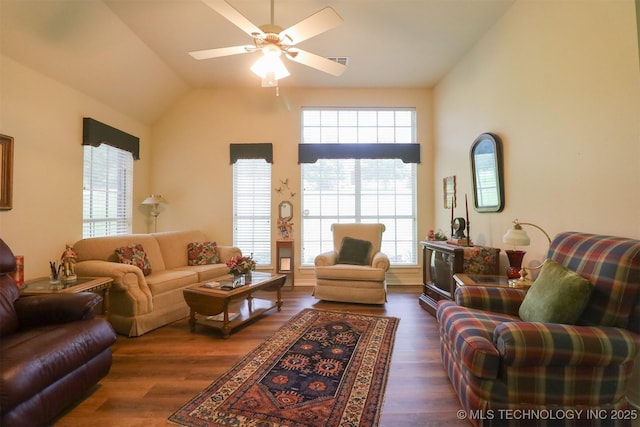 12310 S Mesa Rd, Sapulpa, OK 74066 - living area with healthy amount of natural light, dark wood-style flooring, lofted ceiling, and ceiling fan