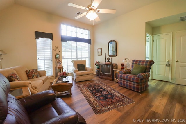 12310 S Mesa Rd, Sapulpa, OK 74066 - living area featuring dark wood-style floors, ceiling fan, and vaulted ceiling