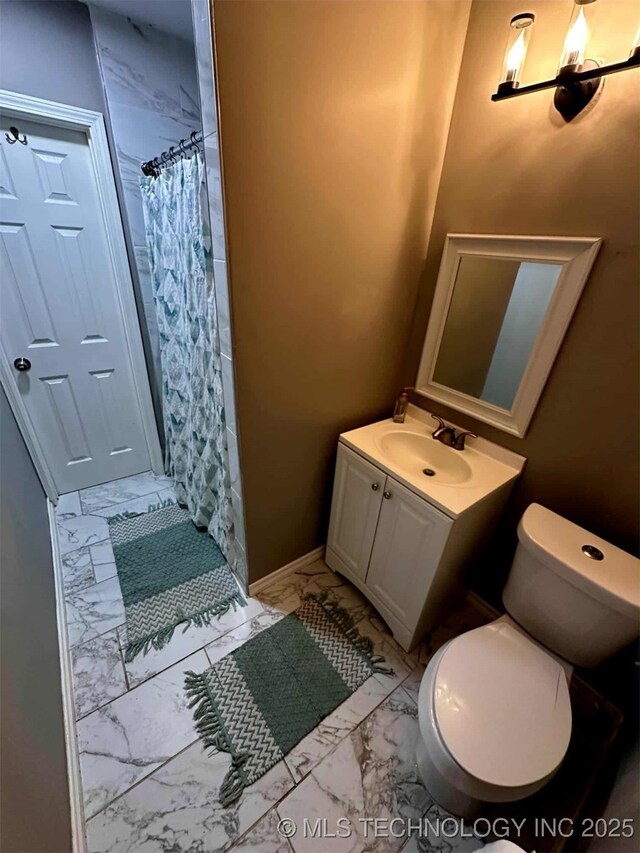 1026 N Utica Ave, Tulsa, OK 74110 - full bathroom with marble finish floors, vanity, and curtained shower