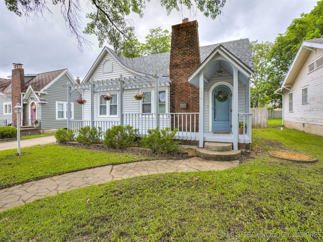 1415 S Osage Ave, Bartlesville, OK 74003 - view of front of property with a pergola, a chimney, and roof with shingles