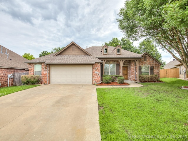 4667 E 144th Pl S, Bixby, OK 74008 - view of front of home featuring a garage, brick siding, and concrete driveway