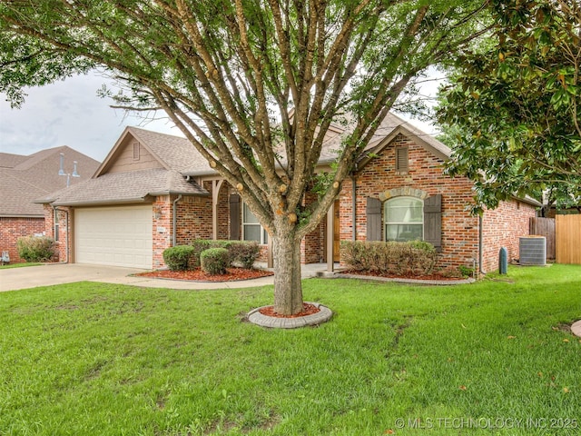 4667 E 144th Pl S, Bixby, OK 74008 - view of front of home with an attached garage, brick siding, concrete driveway, and roof with shingles