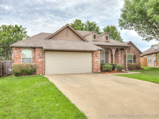 4667 E 144th Pl S, Bixby, OK 74008 - view of front of property featuring roof with shingles, an attached garage, brick siding, and driveway