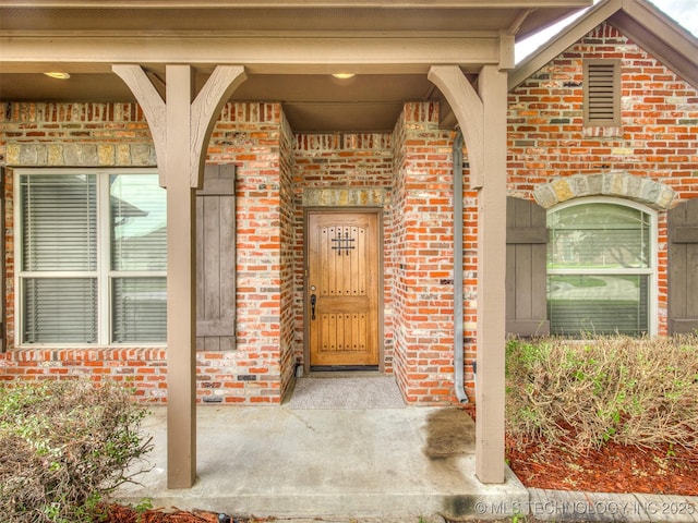 4667 E 144th Pl S, Bixby, OK 74008 - doorway to property with brick siding