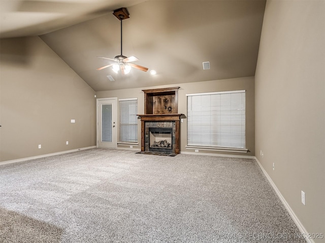 4667 E 144th Pl S, Bixby, OK 74008 - unfurnished living room featuring carpet floors, vaulted ceiling, a ceiling fan, and a tile fireplace