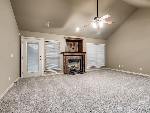 4667 E 144th Pl S, Bixby, OK 74008 - unfurnished living room featuring lofted ceiling, a ceiling fan, carpet flooring, and a fireplace