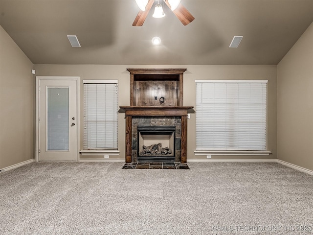 4667 E 144th Pl S, Bixby, OK 74008 - unfurnished living room featuring ceiling fan, a tile fireplace, and carpet floors
