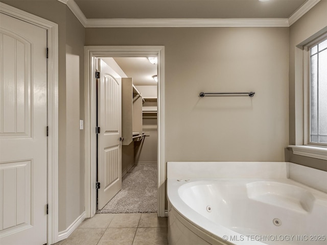 4667 E 144th Pl S, Bixby, OK 74008 - full bath featuring a tub with jets, tile patterned floors, ornamental molding, and a closet