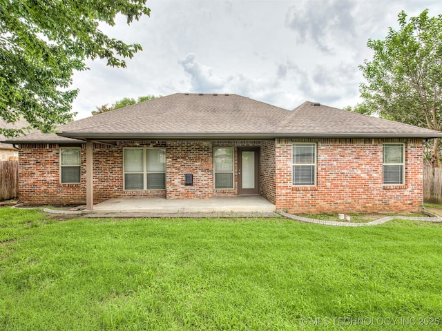 4667 E 144th Pl S, Bixby, OK 74008 - rear view of property featuring brick siding, a shingled roof, and a patio