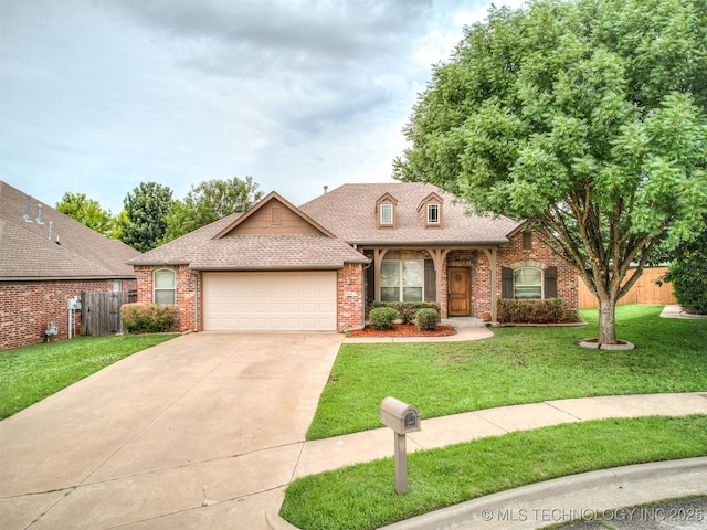 4667 E 144th Pl S, Bixby, OK 74008 - view of front of house featuring brick siding, an attached garage, driveway, and a shingled roof