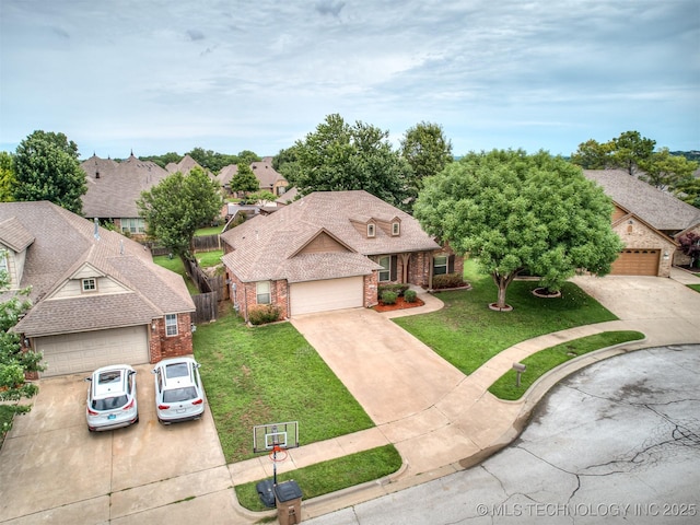 4667 E 144th Pl S, Bixby, OK 74008 - view of front facade featuring brick siding, concrete driveway, a garage, and a shingled roof