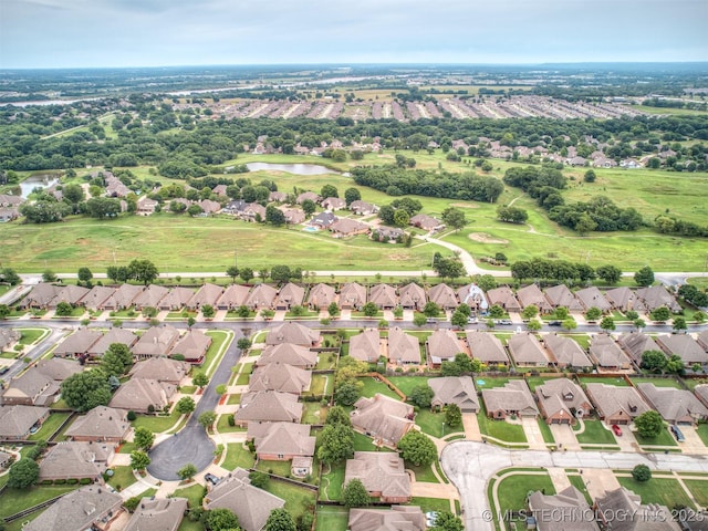 4667 E 144th Pl S, Bixby, OK 74008 - aerial view of residential area featuring a nearby body of water