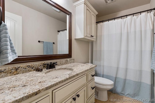 2015 W 109th St, Jenks, OK 74037 - bathroom featuring vanity and toilet