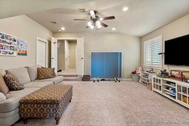 2015 W 109th St, Jenks, OK 74037 - carpeted living room featuring a ceiling fan, recessed lighting, and vaulted ceiling