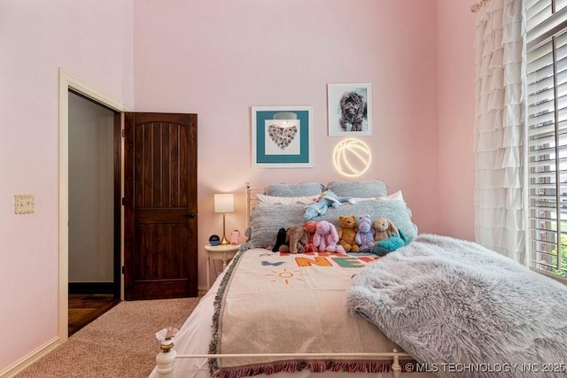 2015 W 109th St, Jenks, OK 74037 - bedroom featuring carpet floors and baseboards