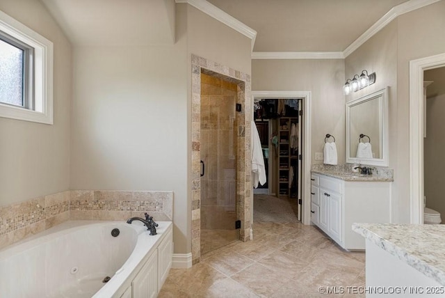 2015 W 109th St, Jenks, OK 74037 - full bathroom with a shower stall, vanity, a jetted tub, a walk in closet, and ornamental molding
