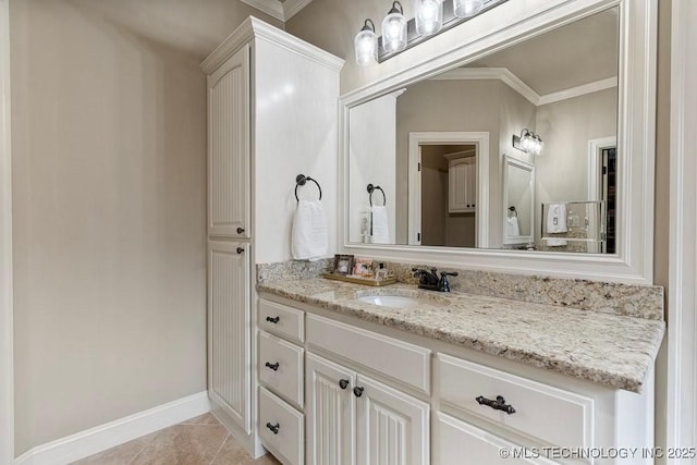 2015 W 109th St, Jenks, OK 74037 - bathroom with crown molding, vanity, and tile patterned floors