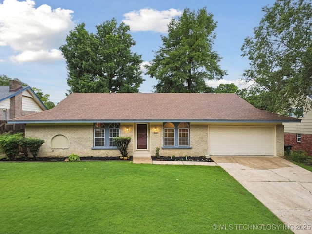 3002 E 80th Pl, Tulsa, OK 74136 - view of front facade with driveway, an attached garage, brick siding, a front lawn, and roof with shingles