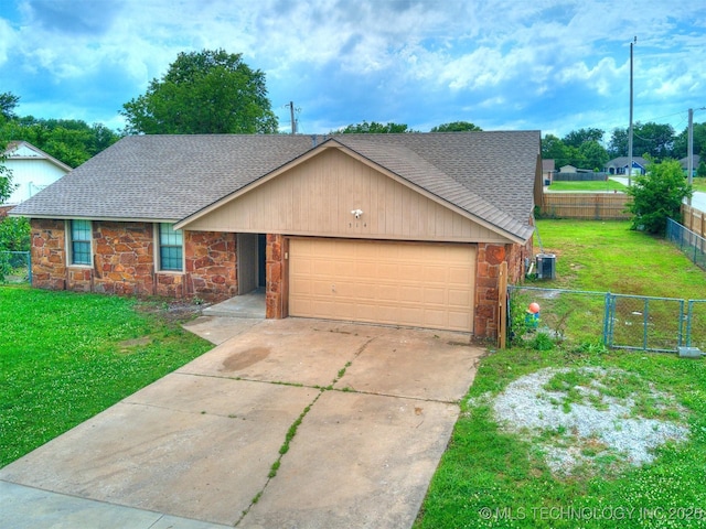 314 N Tallchief St, Skiatook, OK 74070 - view of front of house featuring stone siding, a shingled roof, and a garage