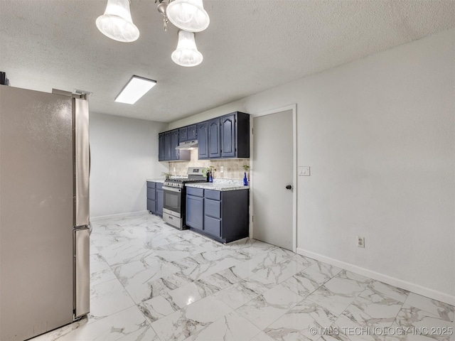 314 N Tallchief St, Skiatook, OK 74070 - kitchen featuring appliances with stainless steel finishes, light countertops, under cabinet range hood, blue cabinetry, and a textured ceiling