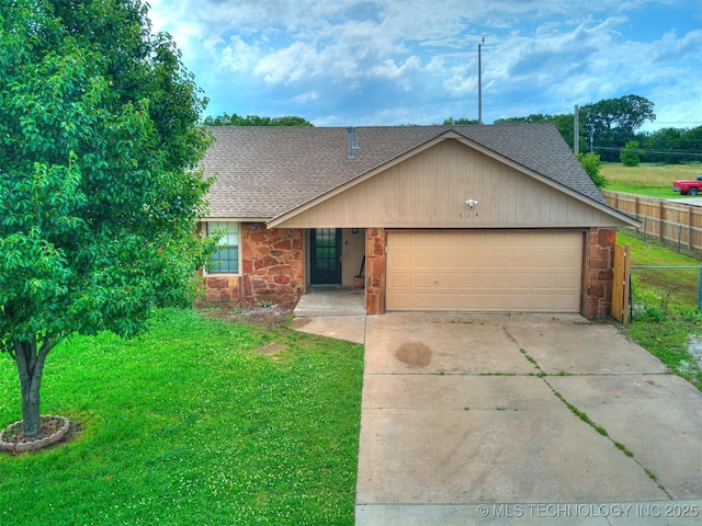 314 N Tallchief St, Skiatook, OK 74070 - view of front of house with roof with shingles, stone siding, driveway, and a garage