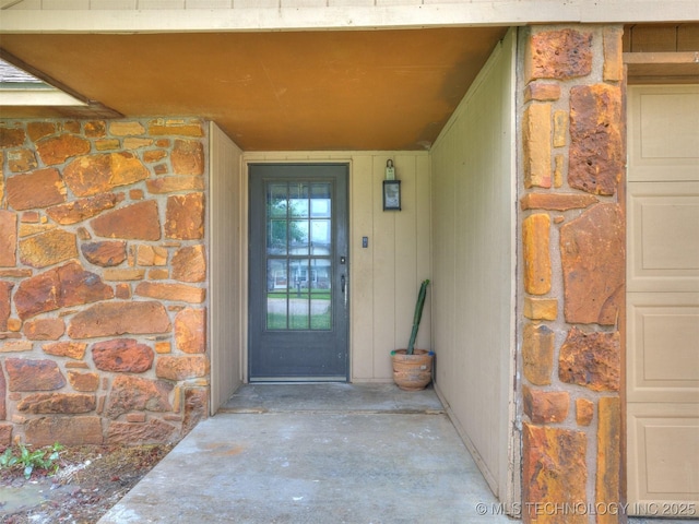 314 N Tallchief St, Skiatook, OK 74070 - property entrance featuring stone siding