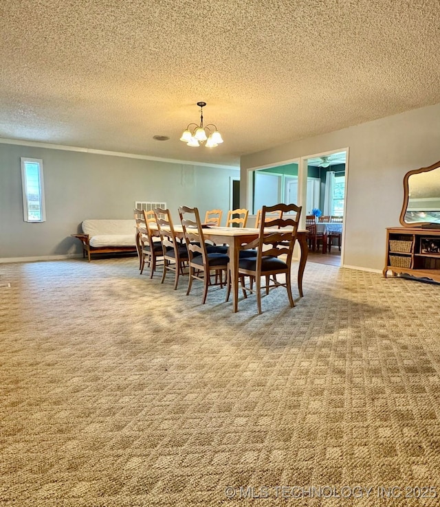 115842 S 4196, Checotah, OK 74426 - carpeted dining room with a textured ceiling, a chandelier, and crown molding