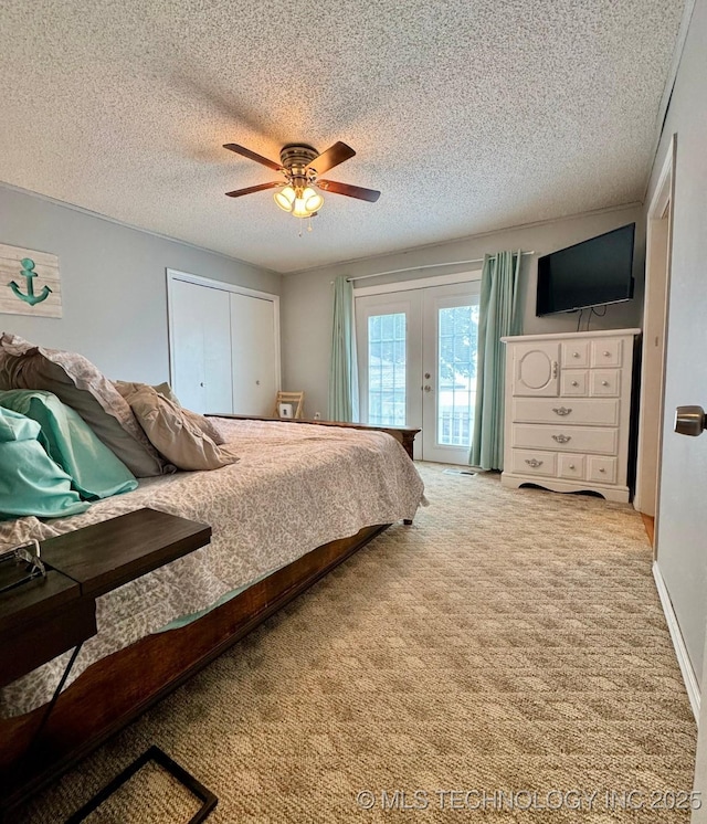 115842 S 4196, Checotah, OK 74426 - bedroom with access to outside, carpet flooring, a textured ceiling, ceiling fan, and a closet