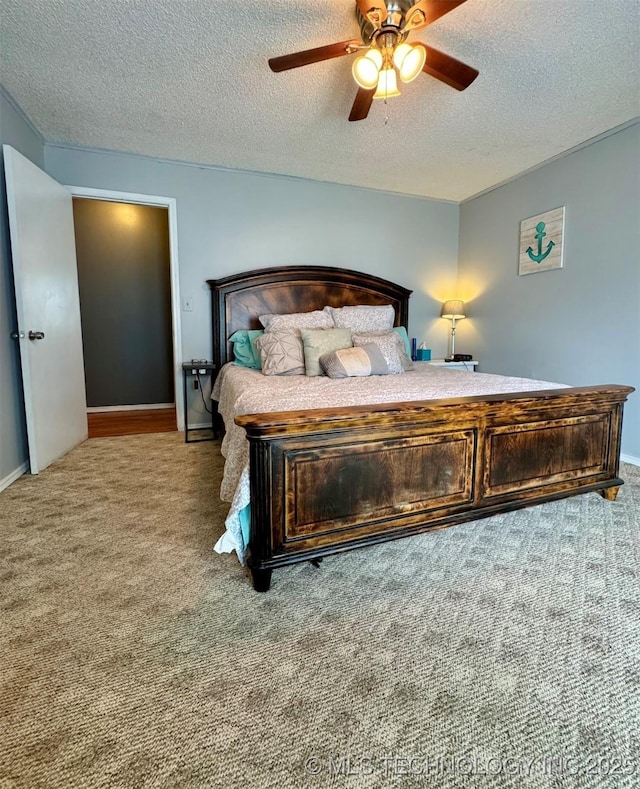 115842 S 4196, Checotah, OK 74426 - carpeted bedroom featuring a textured ceiling and ceiling fan