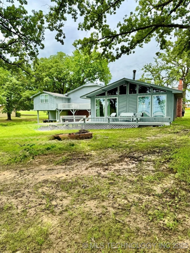 115842 S 4196, Checotah, OK 74426 - back of house with a lawn