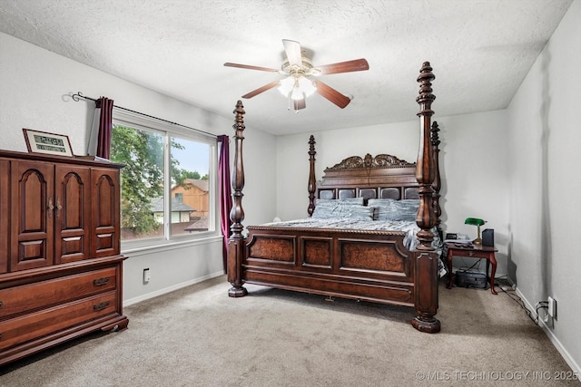 2605 W Atlanta Ct, Broken Arrow, OK 74012 - carpeted bedroom with a textured ceiling and a ceiling fan