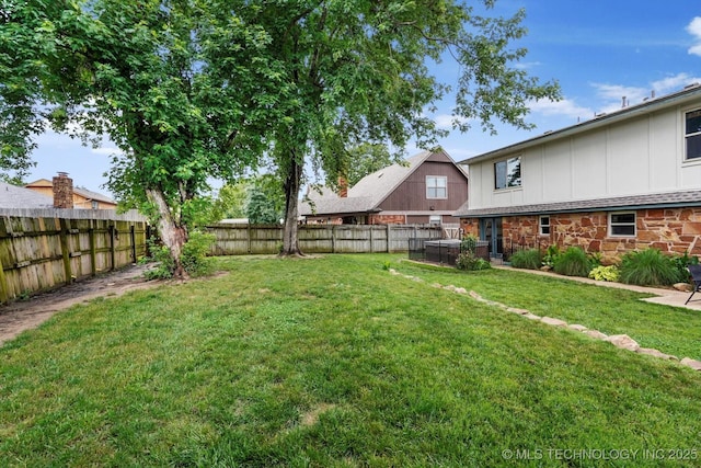 2605 W Atlanta Ct, Broken Arrow, OK 74012 - fenced backyard featuring a hot tub