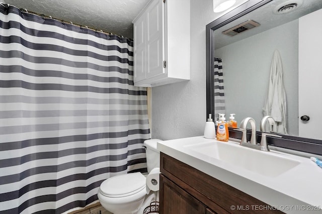 2605 W Atlanta Ct, Broken Arrow, OK 74012 - full bathroom featuring a textured ceiling, vanity, a textured wall, and a shower with curtain