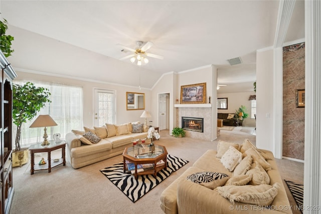 1101 S Yellowood Ave, Broken Arrow, OK 74012 - carpeted living area with healthy amount of natural light, a fireplace, crown molding, a ceiling fan, and vaulted ceiling