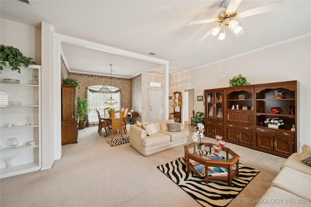 1101 S Yellowood Ave, Broken Arrow, OK 74012 - living area with light colored carpet, crown molding, and ceiling fan