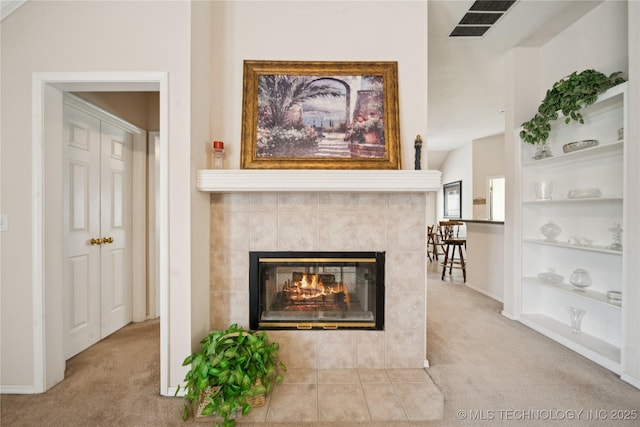 1101 S Yellowood Ave, Broken Arrow, OK 74012 - detailed view of carpet flooring, built in shelves, and a fireplace