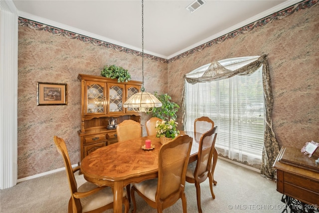 1101 S Yellowood Ave, Broken Arrow, OK 74012 - dining room featuring light colored carpet and ornamental molding