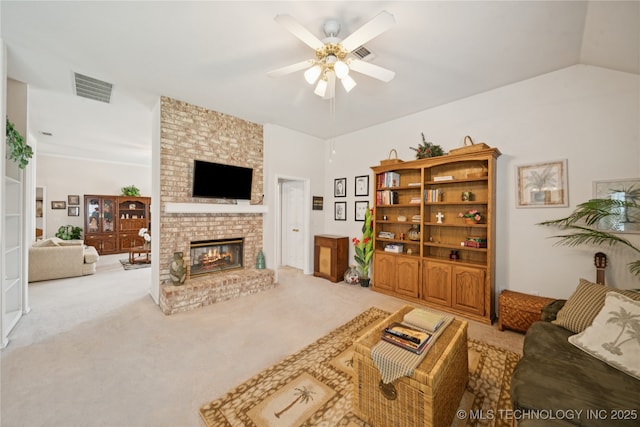 1101 S Yellowood Ave, Broken Arrow, OK 74012 - living room featuring ceiling fan, light colored carpet, and a fireplace