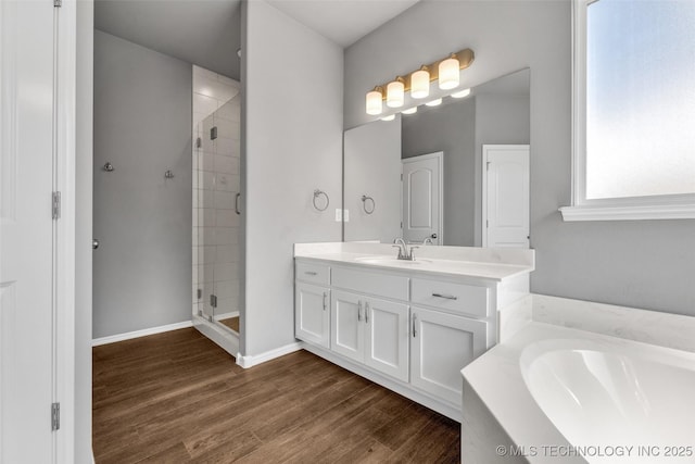 2012 W Huntsville Pl, Broken Arrow, OK 74011 - full bath featuring a stall shower, vanity, wood finished floors, and a bath