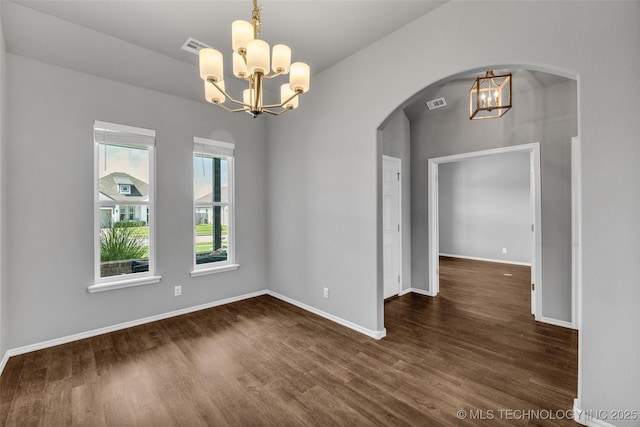 2012 W Huntsville Pl, Broken Arrow, OK 74011 - empty room featuring a chandelier, wood finished floors, and arched walkways