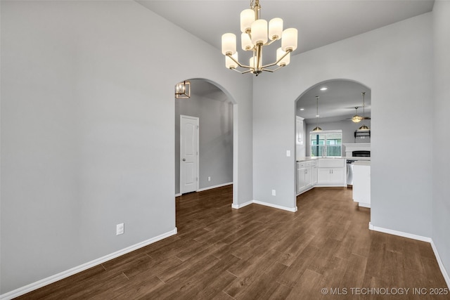 2012 W Huntsville Pl, Broken Arrow, OK 74011 - unfurnished room with arched walkways, dark wood-style flooring, ceiling fan, and a chandelier