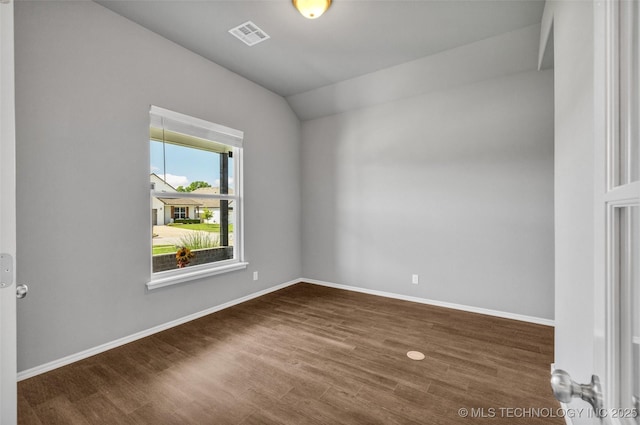 2012 W Huntsville Pl, Broken Arrow, OK 74011 - empty room featuring lofted ceiling and dark wood-type flooring