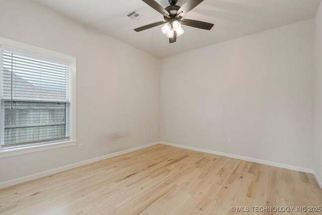 5918 E 126th Pl S, Bixby, OK 74008 - empty room with wood finished floors and ceiling fan