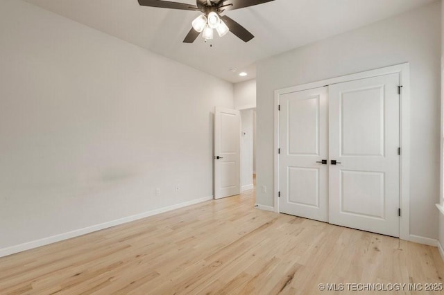 5918 E 126th Pl S, Bixby, OK 74008 - unfurnished bedroom featuring wood finished floors, a closet, recessed lighting, and ceiling fan