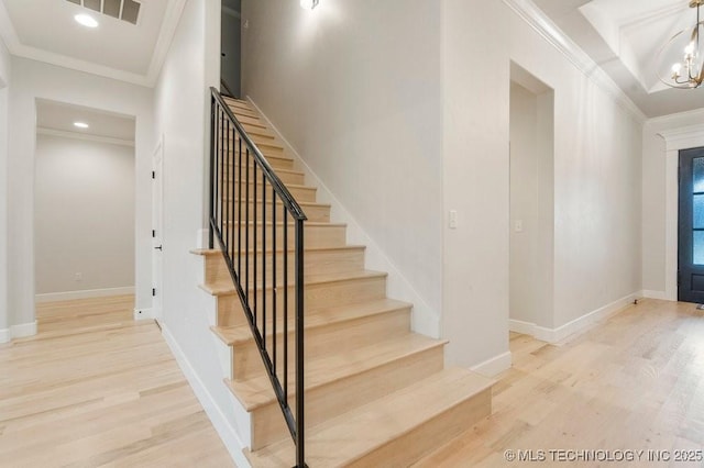 5918 E 126th Pl S, Bixby, OK 74008 - staircase with ornamental molding, wood finished floors, a chandelier, and recessed lighting